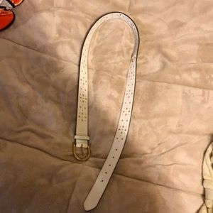 white patterned belt